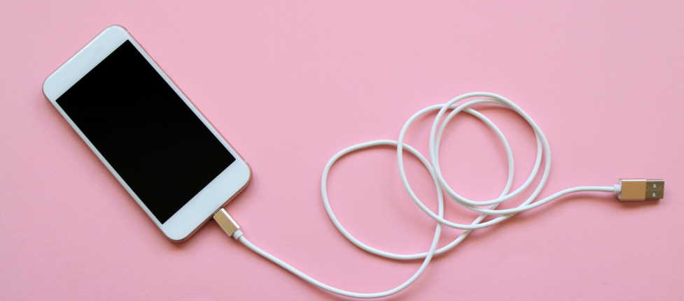 What do I do if my phone charger is plugged in but not charging?